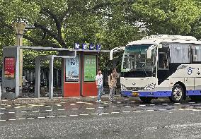 Women, boy stabbed at school bus stop near Shanghai