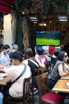 People watch the Fotball Game France - Poland - Paris