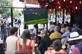 People watch the Fotball Game France - Poland - Paris