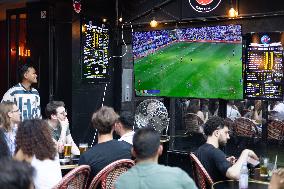 People watch the Fotball Game France - Poland - Paris