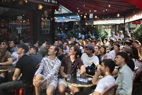 People watch the Fotball Game France - Poland - Paris