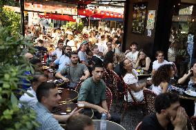 People watch the Fotball Game France - Poland - Paris