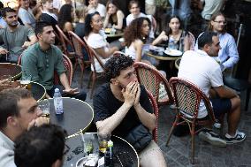 People watch the Fotball Game France - Poland - Paris