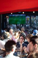 People watch the Fotball Game France - Poland - Paris