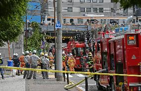 Smoke near railway track in Tokyo