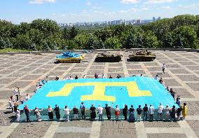 Record for Ukraines largest Crimean Tatar flag set in Kyiv