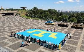 Record for Ukraines largest Crimean Tatar flag set in Kyiv