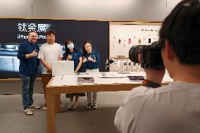 Customers Experience Apple Vison Pro at an Apple store in Shanghai