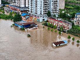 Houses And Fields Flooded in Qiandongnan, China