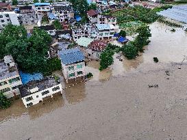 Houses And Fields Flooded in Qiandongnan, China