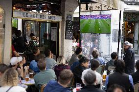 People watch the Football Game France - Belgium - Paris