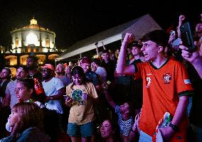 Fans watch the national team game at Jardim do Morro