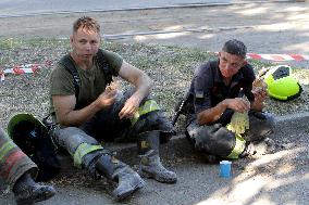 Removing rubble at Dnipro apartment block hit by Russian missile on June 28