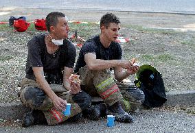 Removing rubble at Dnipro apartment block hit by Russian missile on June 28