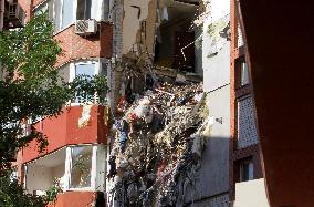 Removing rubble at Dnipro apartment block hit by Russian missile on June 28