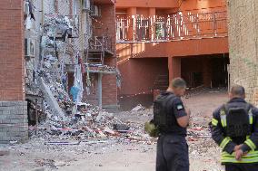 Removing rubble at Dnipro apartment block hit by Russian missile on June 28