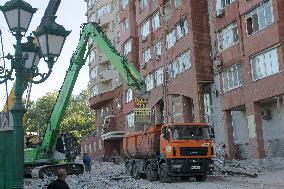 Removing rubble at Dnipro apartment block hit by Russian missile on June 28