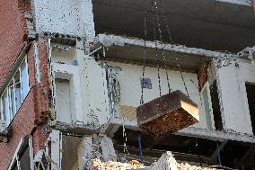 Removing rubble at Dnipro apartment block hit by Russian missile on June 28