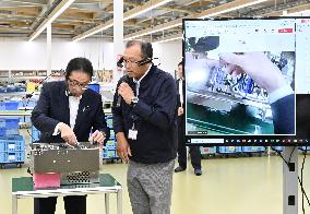 Japan PM Kishida at electronic component factory