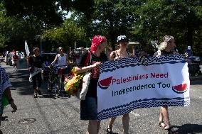 Pro-Palestinian Activists March During The Fourth Of July Parade In Washington DC