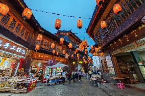 Tourists Enjoy Tea Horse Ancient City in Pu 'er