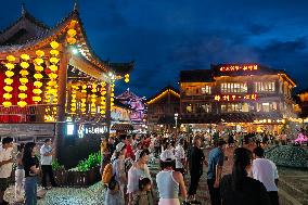 Tourists Enjoy Tea Horse Ancient City in Pu 'er