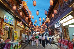 Tourists Enjoy Tea Horse Ancient City in Pu 'er