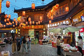 Tourists Enjoy Tea Horse Ancient City in Pu 'er