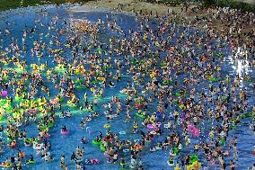 People Cool Off at A Water Park in Nanjing