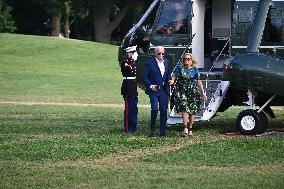 U.S. President Joe Biden And First Lady Jill Biden Arrive On The South Lawn Of The White House In Washington D.C.