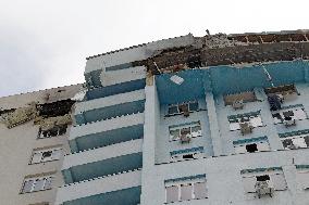 Consequences of Russian missile attack in Kyivss Solomianskyi district