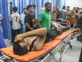MIDEAST-GAZA CITY-ISRAEL-ATTACKS-INJURED PEOPLE