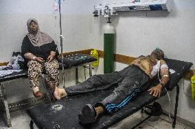 MIDEAST-GAZA CITY-ISRAEL-ATTACKS-INJURED PEOPLE