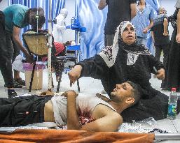 MIDEAST-GAZA CITY-ISRAEL-ATTACKS-INJURED PEOPLE