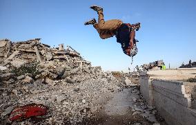 Parkour in Gaza Among Ruins of Bombed Building Amid Hamas-Israel Conflict