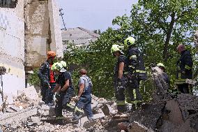 Section of Kyiv apartment block destroyed by Russian missile strike