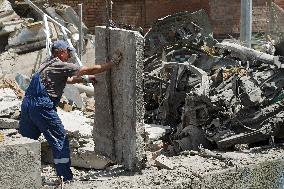 Section of Kyiv apartment block destroyed by Russian missile strike