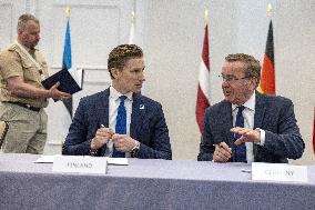 Signing of a sea mine cooperative agreement at the NATO summit