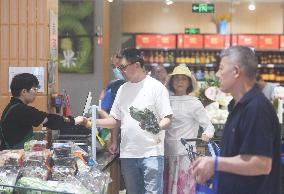 Customers Shop at A Supermarket in Hangzhou