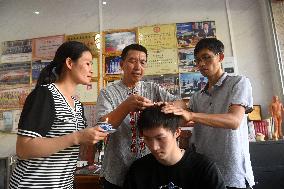 CHINA-GUANGXI-JINXIU-MOXIBUSTION THERAPY-INHERITOR (CN)