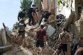 Removing rubble at Kyiv apartment block