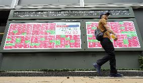 Nikkei ends at new record high