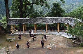 EnchantingGuangxi | Villagers still enchanted by yellow mud drums in S China's Guangxi