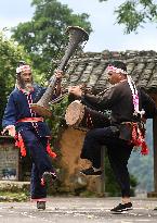 EnchantingGuangxi | Villagers still enchanted by yellow mud drums in S China's Guangxi