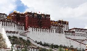 Tourists Visit The Potala Palace in Lhasa