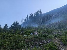 Wildfire Continues To Burn In Hills Above Peachland - British Columbia