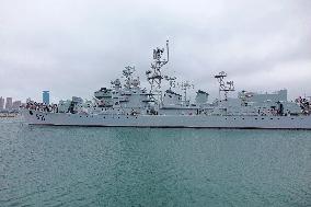 Tourists Visit A Decommissioned Warship in Qingdao