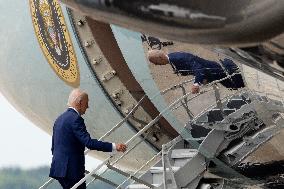 US President Joe Biden boards Air Force One at Joint Base Andrews, Maryland