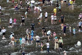 Tourists Enjoy Cooling Off in The Water in Fujian