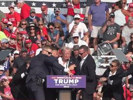 FOCUS | Trump escorted off stage during Pennsylvania Rally after loud noises rang out in crowd